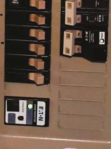 Eaton whole-home surge protector installed in a residential electrical panel